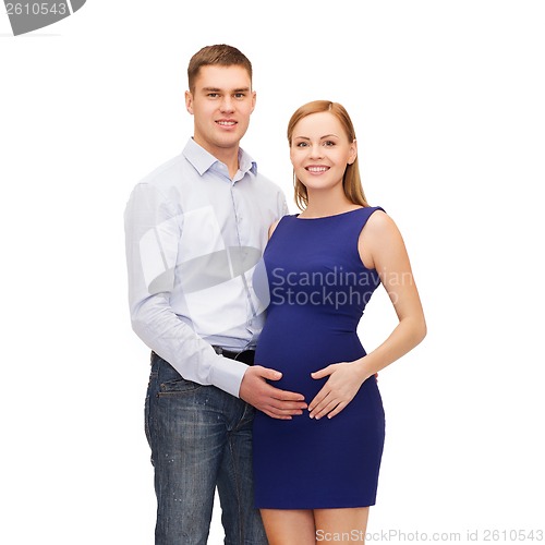 Image of happy young family expecting child