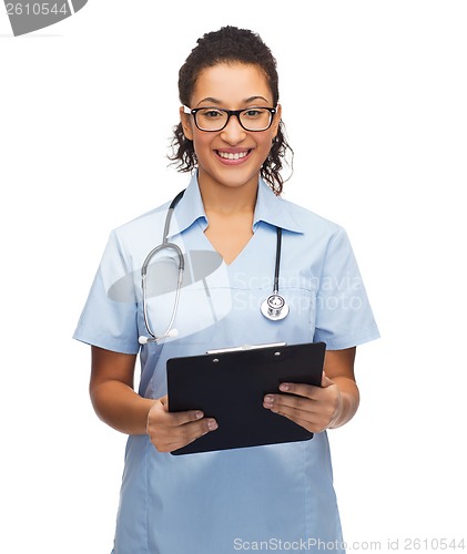 Image of smiling female african american doctor or nurse