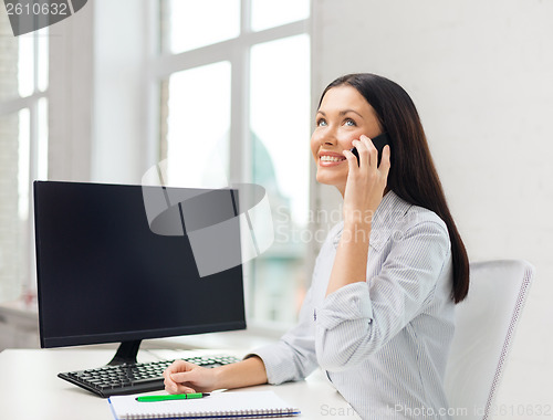 Image of smiling businesswoman or student with smartphone
