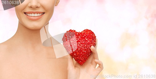 Image of beautiful woman with red heart