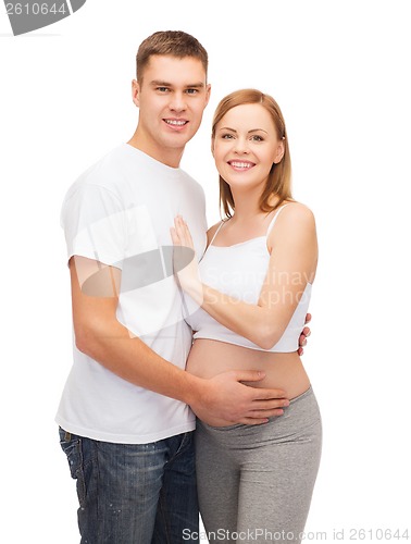 Image of happy young family expecting child