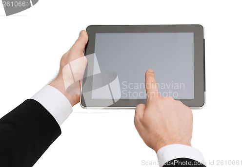 Image of close up of man hands touching tablet pc