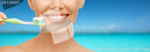 Image of woman with toothbrush