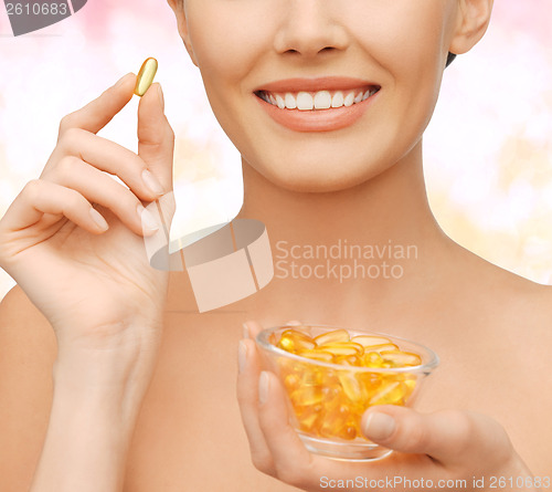 Image of beautiful woman with omega 3 vitamins