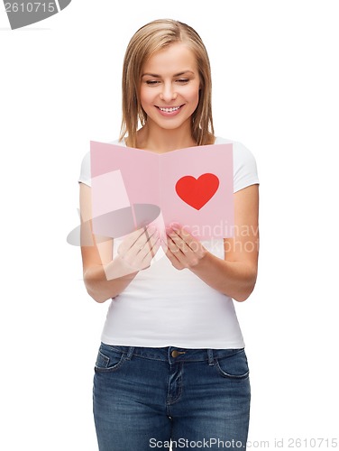 Image of smiling girl with postcard