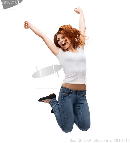 Image of teenage girl in white blank t-shirt jumping