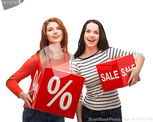 Image of smiling teenage girl with percent and sale sign