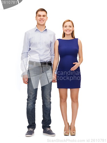 Image of happy young family expecting child