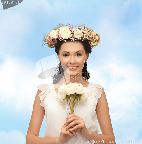 Image of woman wearing wreath of flowers