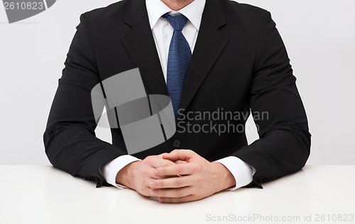 Image of close up of buisnessman in suit and tie