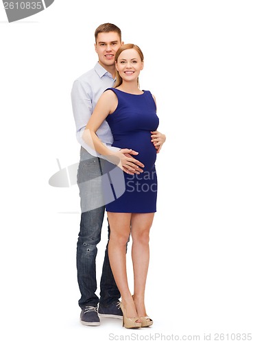 Image of happy young family expecting child