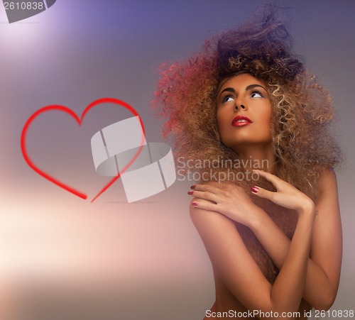 Image of woman with long curly hair