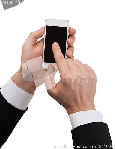 Image of businessman touching screen of smartphone