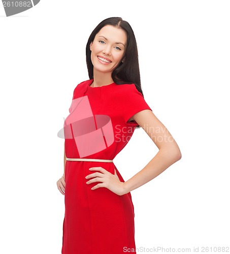 Image of smiling young woman in red dress