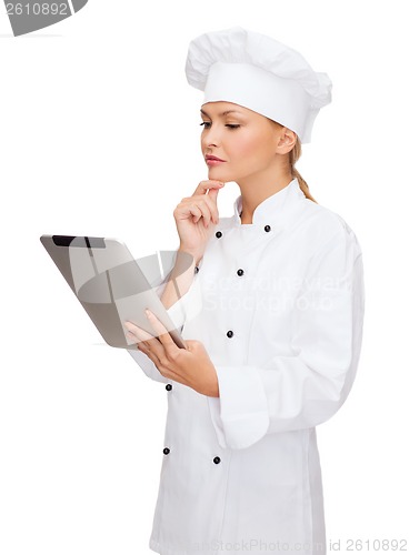 Image of smiling female chef with tablet pc computer