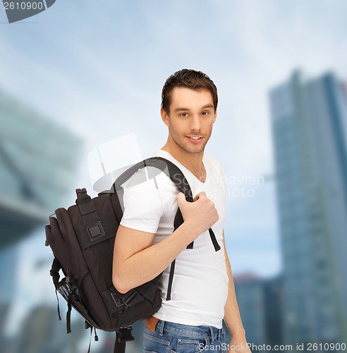 Image of travelling student with backpack outdoor