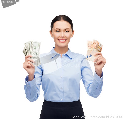 Image of businesswoman with dollar and euro cash money