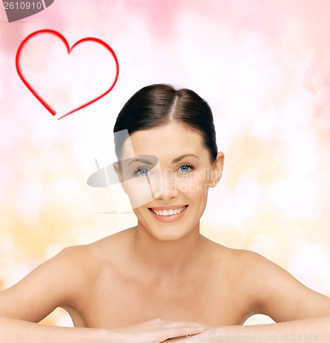 Image of face and hands of beautiful woman