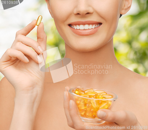 Image of beautiful woman with omega 3 vitamins