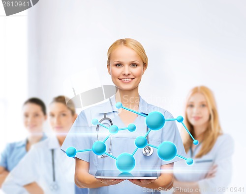 Image of smiling female doctor or nurse with tablet pc