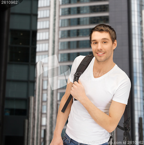 Image of travelling student with backpack outdoor