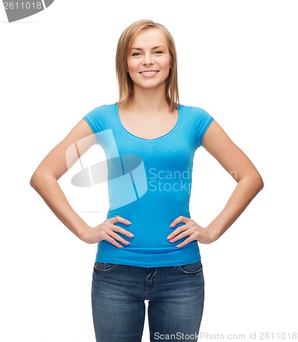 Image of smiling girl in blank blue t-shirt