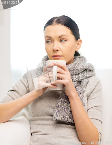 Image of ill woman with flu at home