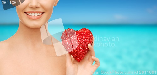 Image of woman with red heart