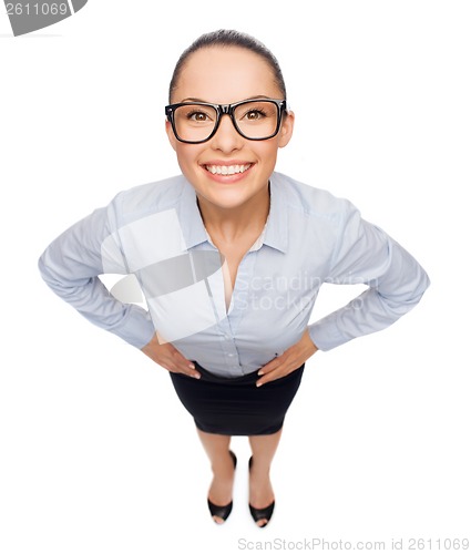 Image of smiling businesswoman in eyeglasses