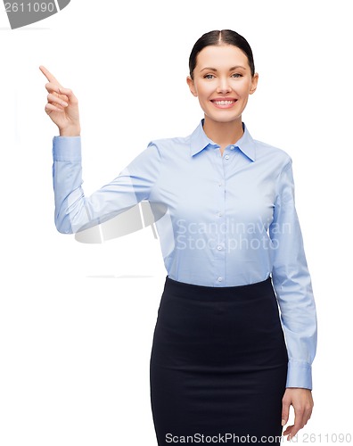 Image of smiling woman with her finger up