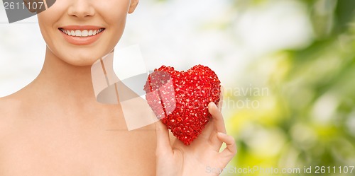 Image of beautiful woman with red heart