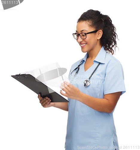 Image of smiling female african american doctor or nurse