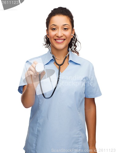 Image of smiling female african american doctor or nurse