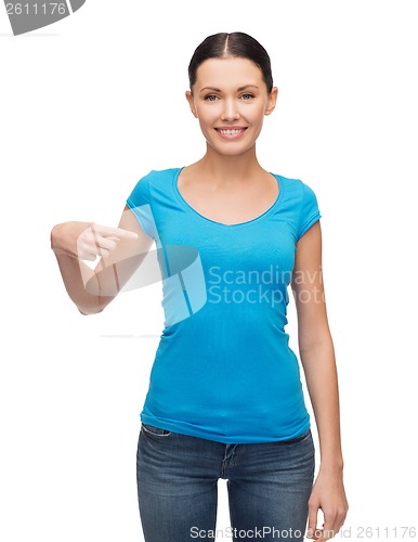 Image of smiling girl in blank blue t-shirt