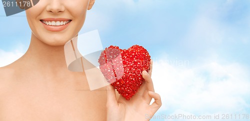 Image of beautiful woman with red heart