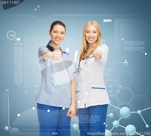 Image of two doctors showing thumbs up