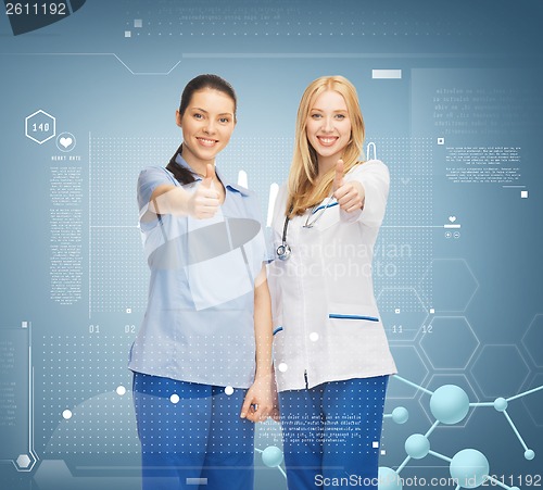 Image of two doctors showing thumbs up