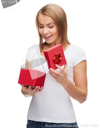 Image of smiling girl with gift box