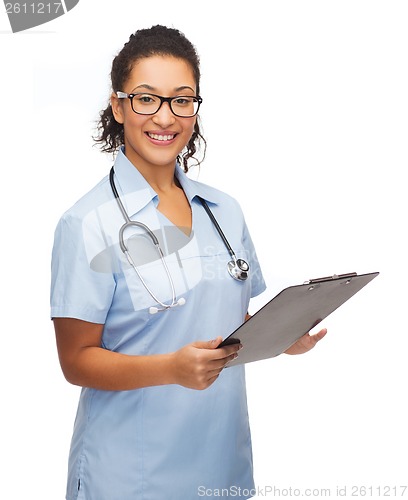 Image of smiling female african american doctor or nurse