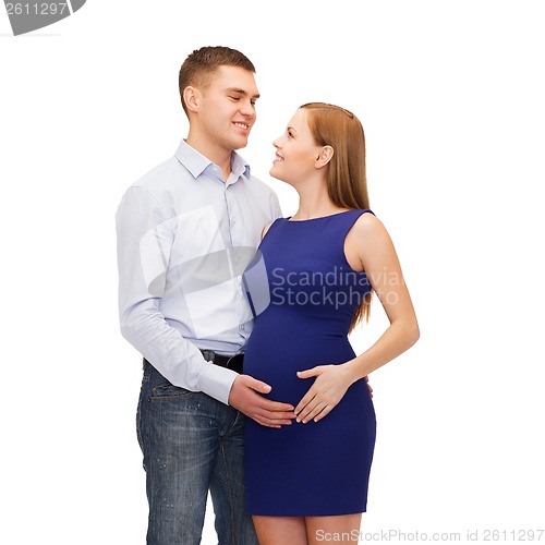 Image of happy young family expecting child