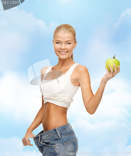 Image of sporty woman showing big pants