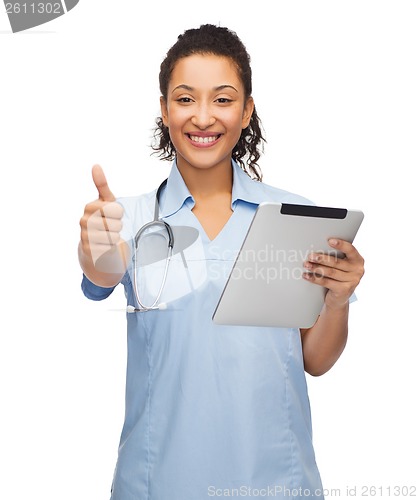 Image of doctor or nurse with stethoscope and tablet pc