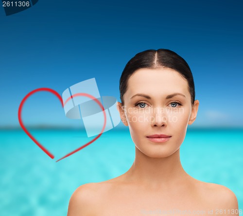 Image of face and shoulders of beautiful woman