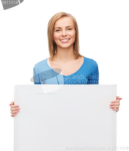 Image of smiling girl with blank white board