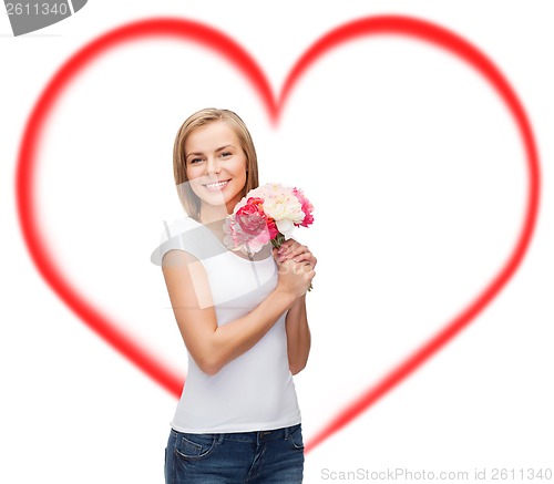 Image of smiling woman with bouquet of flowers