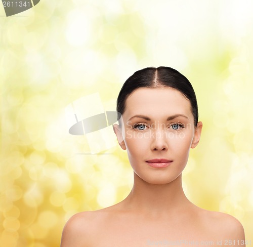 Image of face and shoulders of beautiful woman