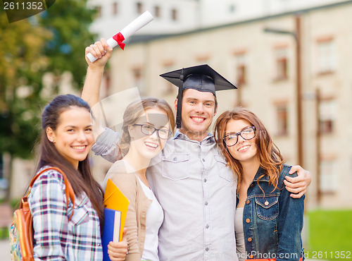 Image of students or teenagers with files and diploma