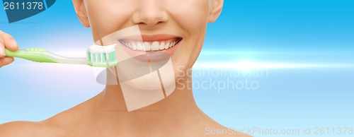 Image of woman with toothbrush