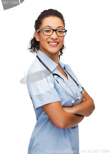 Image of smiling female african american doctor or nurse