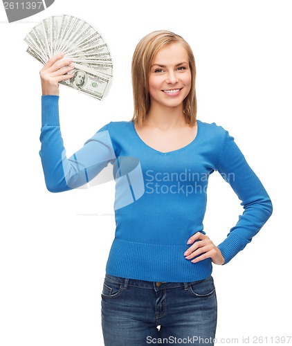 Image of smiling girl with dollar cash money